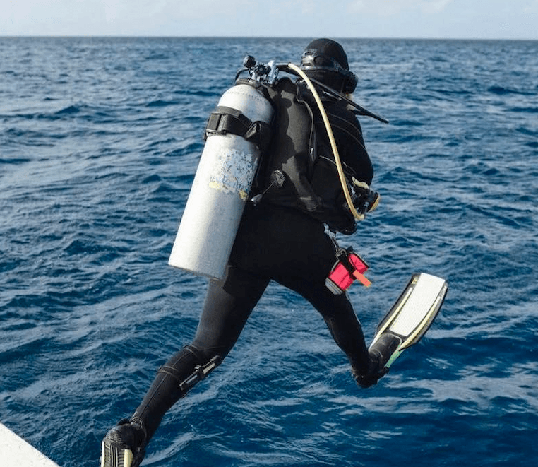 Person diving into water, symbolizing diving deep into benefits management
